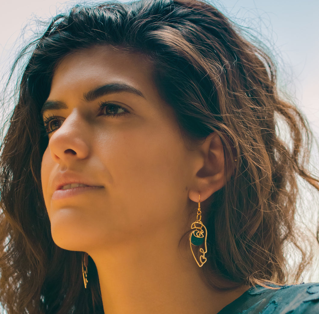 Women wearing Abstract Face Earring